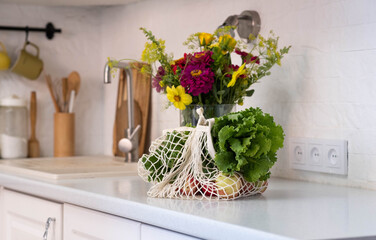 Experience the beauty of Fresh Produce and Vibrant Flowers showcased in a Modern Kitchen