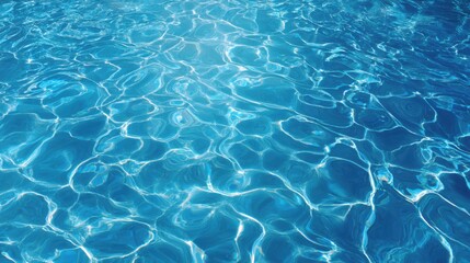 Obraz premium A tranquil water surface glistens under bright midday sunlight, showcasing gentle ripples that create mesmerizing patterns. The vibrant blue color invites relaxation and calm.