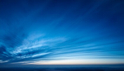 abstract blue horizon striped cloudscape at dusk low light photography stock photo