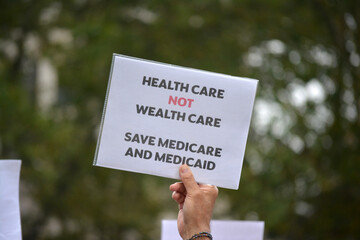 Sign at a rally celebrating Medicare and Medicaid.