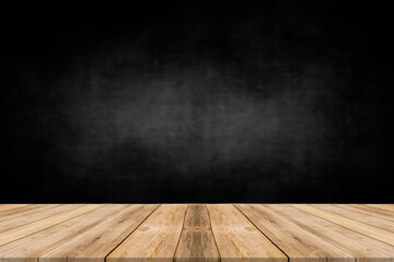 Rough wooden table with black wall background
