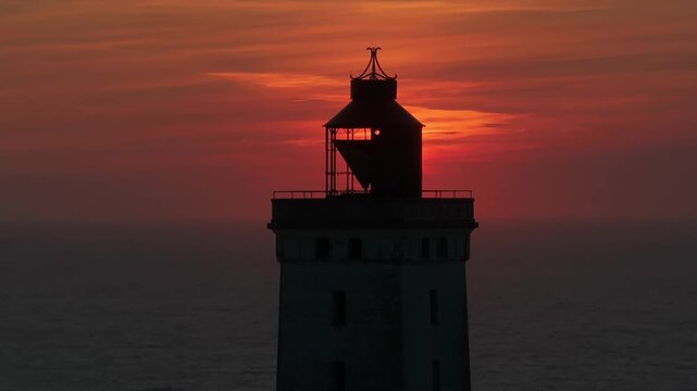 Aerial view of the giant sand dunes with the famous lighthouse on the top of a hill. Rubjerg Knude Lighthouse, , North SeaRubjerg , Sunset at the lighthouse Rubjerg Knude Fyr near Lokken in Denmark. 