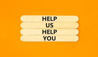 Help you symbol. Concept words phrase Help us help you on beautiful wooden stick. Beautiful orange...