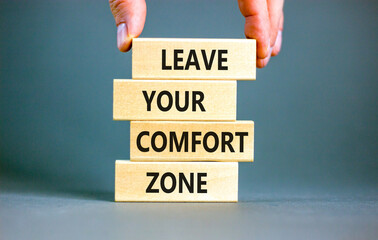 Leave your comfort zone symbol. Concept words Leave your comfort zone on beautiful wooden blocks....