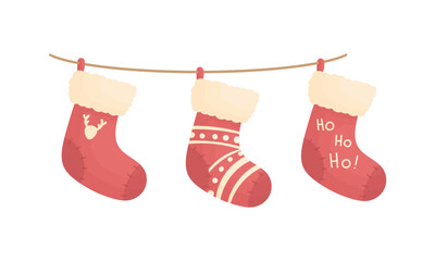 Three Christmas socks on a rope with different patterns. Christmas home decorations. New Year elements © Асель Макарова