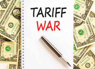 Trade tariff war symbol. Concept word Tariff war on beautiful white note. Dollar bills. Beautiful...
