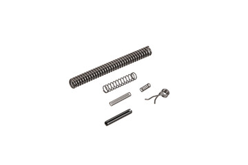 
A small collection of firearm springs and a pin, isolated on a white back