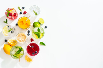 Summer drinks, colored cocktails on white background.