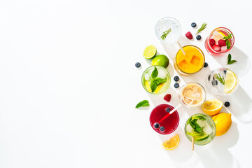 Summer drinks, colored cocktails on white background.