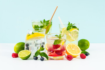 Lemonade set on colored background.