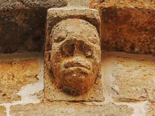 Carved anthropomorphic head at Virgen de la Soledad in Calatañazor
