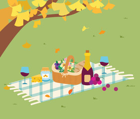 Picnic scene with wine, basket, food, Autumn trees