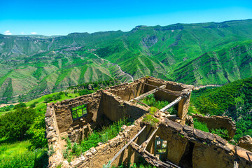 View of the ruins of an abandoned mountain village in the mountains of the North Caucasus