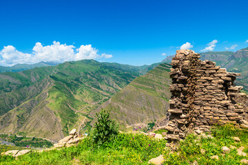 Picturesque view with ruins above a mountain canyon. North Caucasus