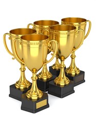 Four gold trophies on a white background