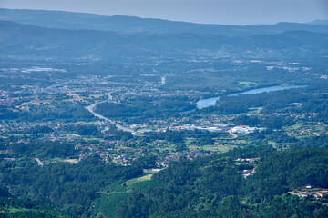 Galician landscape captured from Mount Tecla, showing the road, the river, and the extensive rural surroundings of Pontevedra.