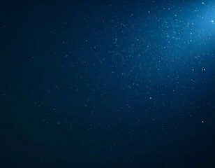 Obraz premium Floating dust particles illuminated by a single cinematic beam of light on a dark gradient background