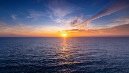 Fototapeta premium magnificence of a sunrise upon horizon encapsulating ethereal hues boundless vastness of ocean and profound interconnection between terrestrial realm and celestial heavens