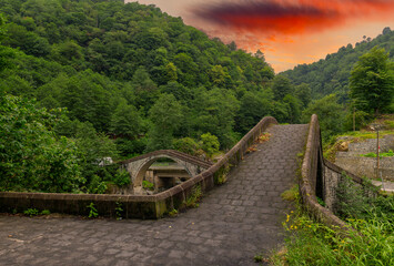 Historical bridges and rivers firtina rivers and cifte bridge Turkey. Old and historic bridges green nature, on river Artvin turkey. ''Cifte Kopru''double bridge area.