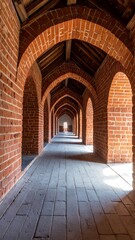 Obraz premium Historic brick corridor with wooden roof