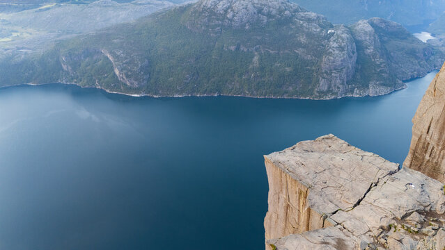 On the edge of the huge cliff in Norway, Preikestolen Cliff preikestolen cliffs