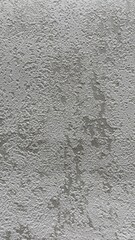 Rough textured surface with irregularities — versatile background for design, architecture, and visual content