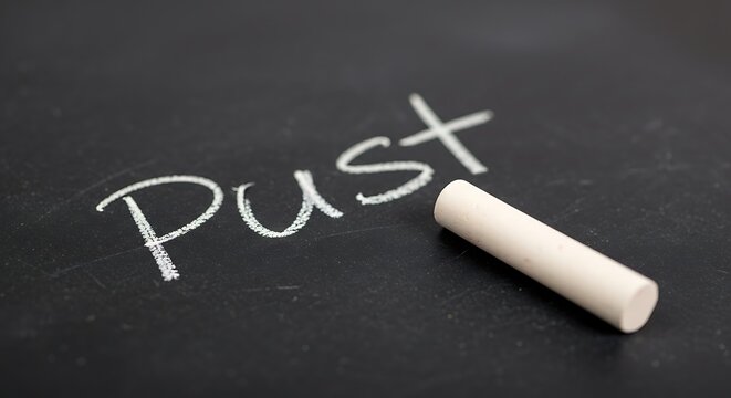 Pust Word on Blackboard with Chalk Concept of School Education Learning and Teaching Process