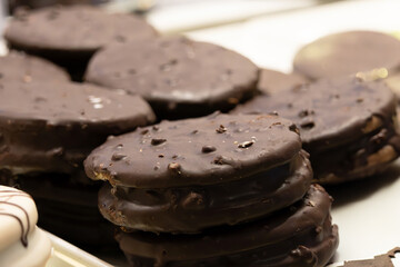 A portion of Argentine alfajor covered in dark chocolate