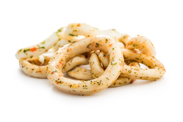 Marinated squid rings isolated on white background.