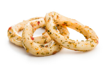 Marinated squid rings isolated on white background.