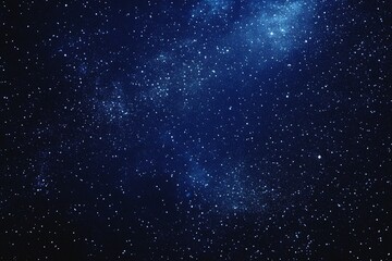 Fototapeta premium Starry sky background, blue night sky full of stars, glowing stars in the dark space, starry background, dark night, stars in the distance, starlight, dark background with a blue glow, night sky. 