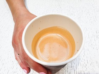Espresso in a cup. Fresh, natural, strong black coffee in a cup, close-up.