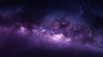 Fototapeta premium Deep purple and blue galaxy; a cosmic expanse of stars and nebulae in night sky