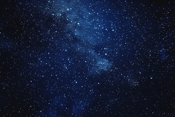 Naklejka premium Starry sky background, blue night sky full of stars, glowing stars in the dark space, starry background, dark night, stars in the distance, starlight, dark background with a blue glow, night sky. 