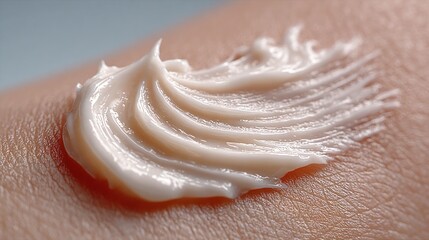 Fototapeta premium Creamy lotion on skin close-up