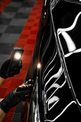 Car paint inspection using detailing inspection light before polishing or ceramic coating. Swirl...