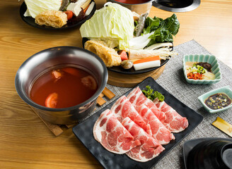 Pork Collar Hot Pot with Thinly Sliced Raw Meat and Fresh vegetables in tray side view of Asian food