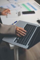 Portrait of young Hispanic professional business woman standing in office. Happy female company executive, smiling businesswoman entrepreneur corporate leader manager looking at camera using tablet