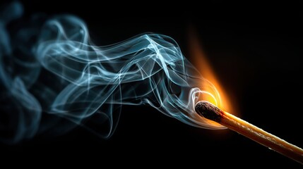 Matchstick ignites and produces smoke in a dark environment