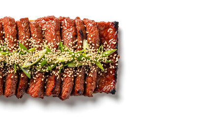 Close up of korean beef jerky topped with sesame seeds and green onions on a white background surface fundo branco