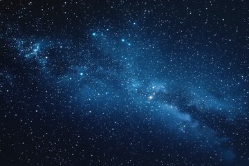 Naklejka premium Starry sky background, blue night sky full of stars, glowing stars in the dark space, starry background, dark night, stars in the distance, starlight, dark background with a blue glow, night sky. 