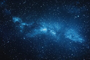 Obraz premium Starry sky background, blue night sky full of stars, glowing stars in the dark space, starry background, dark night, stars in the distance, starlight, dark background with a blue glow, night sky. 