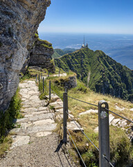 Hiking trail climbing up to Monte Generoso on the Switzerland-Italy border, offering a scenic...