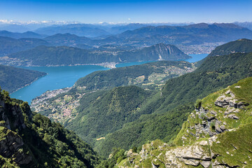 Beautiful landscape from the top of Monte Generoso, offering a magnificent panoramic view of Lake Lugano and Swiss alps, Switzerland