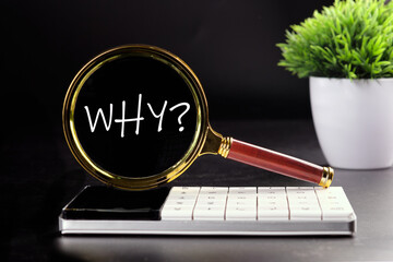 WHY text seen with a magnifying glass on a black background