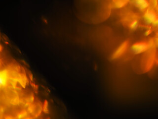 Colorful light leaks on black background for design and special effects. Retro film look. Abstract...