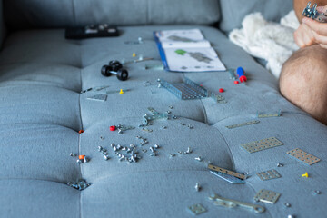 play, games, bolts and nuts from a children's construction set, game, assembling children's...