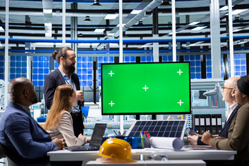 Shareholders being shown strategic growth opportunities on mockup display. Investor addresses...