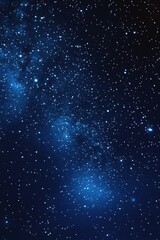 Obraz premium Starry sky background, blue night sky full of stars, glowing stars in the dark space, starry background, dark night, stars in the distance, starlight, dark background with a blue glow, night sky. 