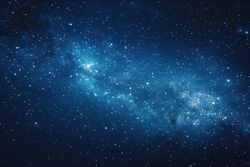 Obraz premium Starry sky background, blue night sky full of stars, glowing stars in the dark space, starry background, dark night, stars in the distance, starlight, dark background with a blue glow, night sky. 